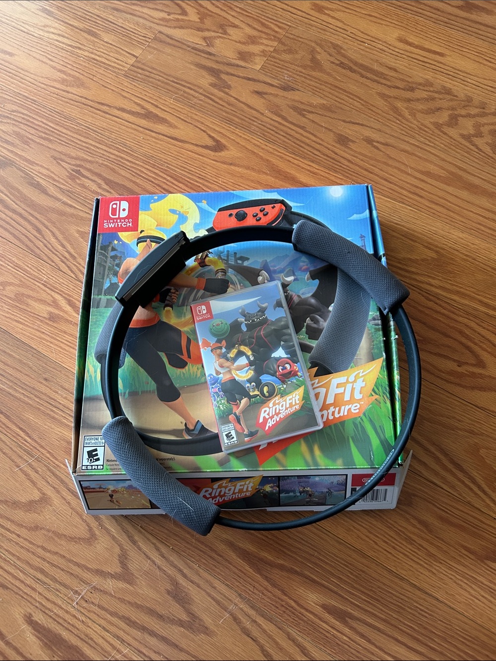 Nintendo Ring Fit Adventure Set with Black Ring and Orange Joy-Con